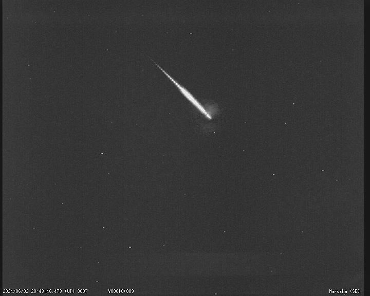 Bright fireball from the weak June Draconids shower